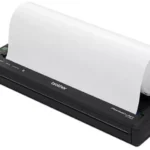 De Brother PA-RH600 is een zwarte accessoire die compatibel is met diverse Brother PocketJet- en sublimatieprinters, waaronder de PJ-663, PJ-722,